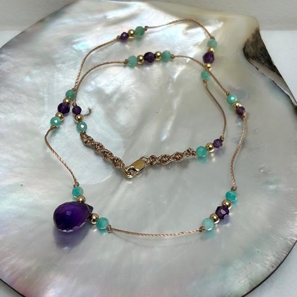 Gold plated chain necklace with oval faceted blue chalcedony